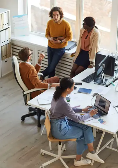 Team collaborating around a table